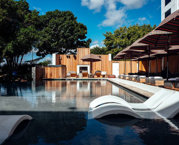 Empty swimming pool with table & chairs