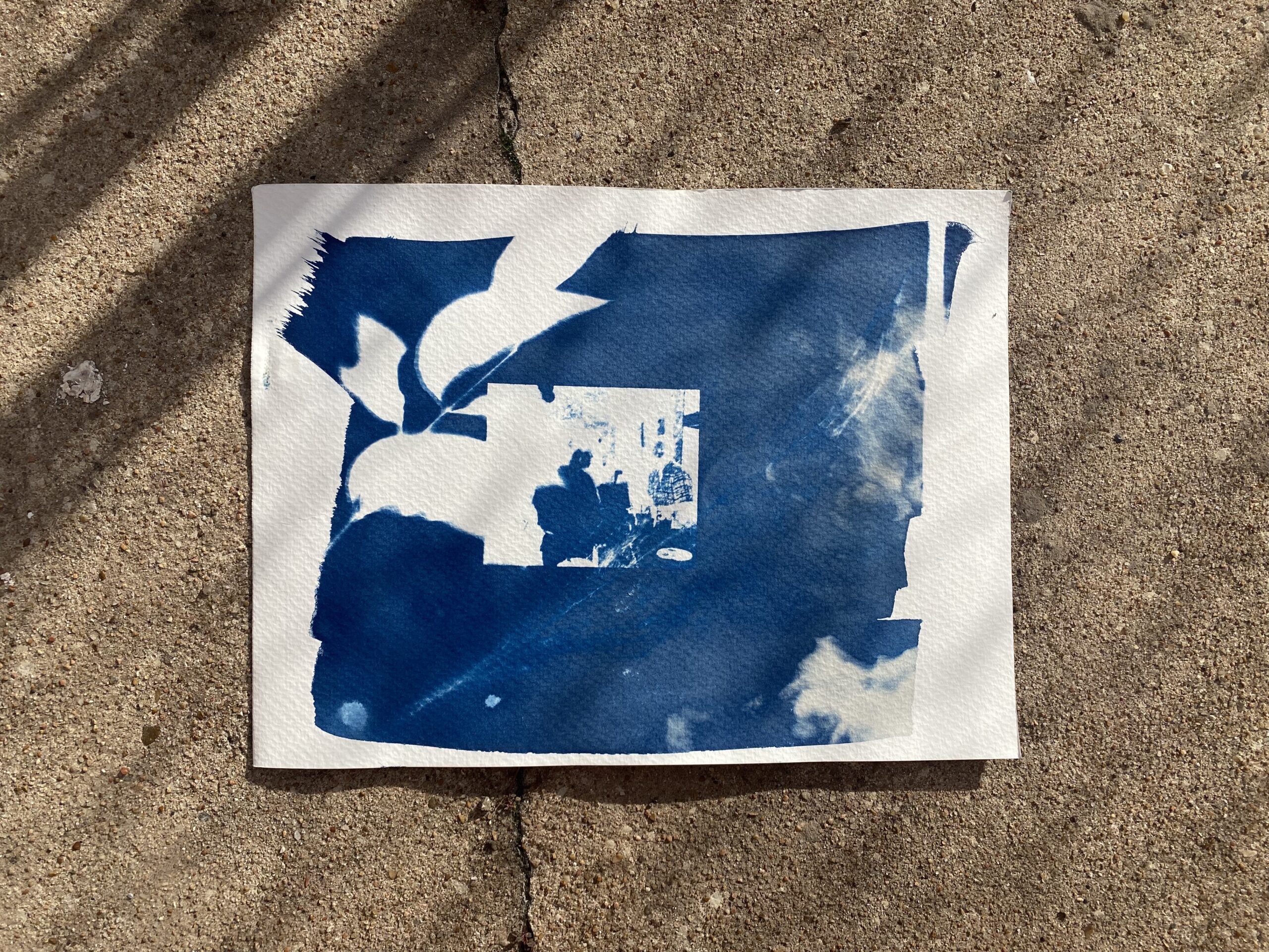 a paper with a blue paint