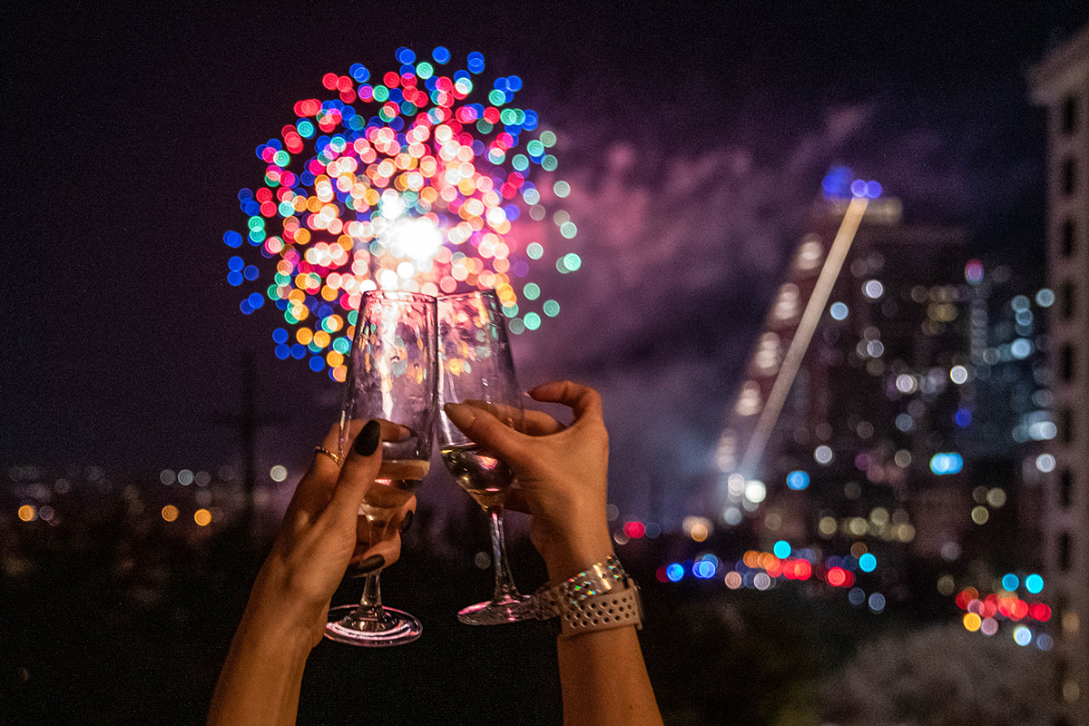 toasting with firework at the rooftop