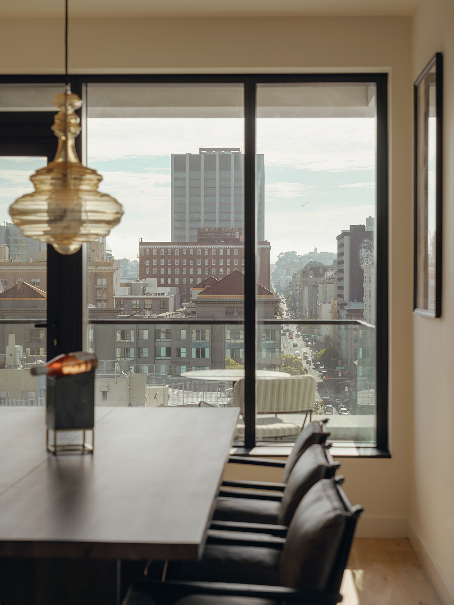The skyline view seen from a dining table's perspective is captivating.